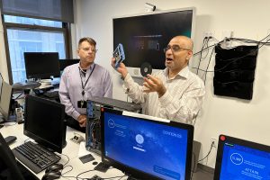 Joseph Garofalo (left) and Prakash Bhatia in the SUNY ATTAIN lab at GMHC.