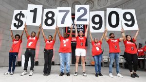 GMHC staff during the AIDS Walk 2024 fundraising total ceremony